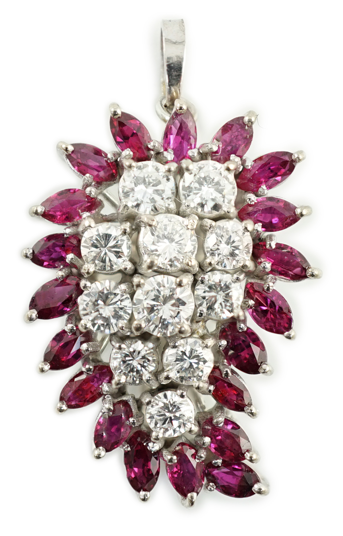 A modern white gold, ruby and diamond set pear shaped cluster pendant